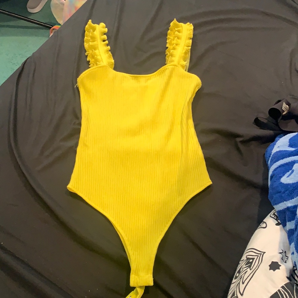 Medium yellow Were All Pretty Girls body suit